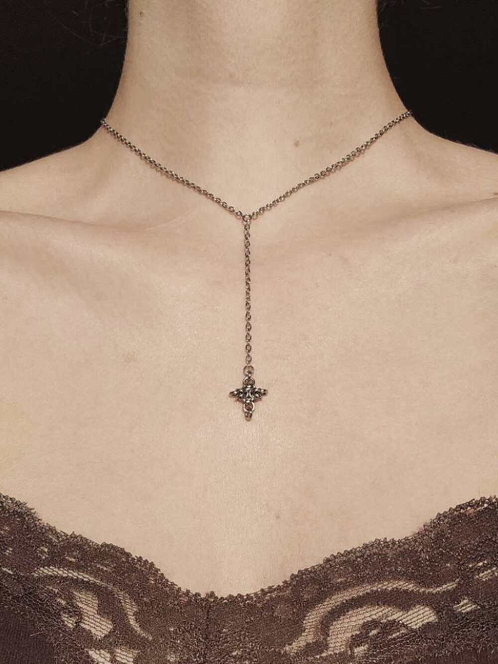Gothic silver rosary necklace with a star pendant